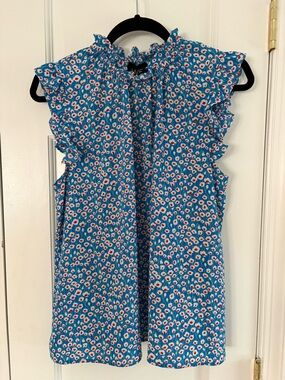 Summer light blue top with red and white flowers